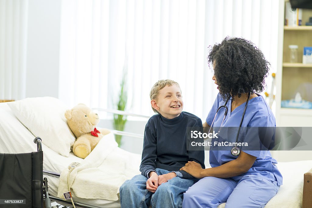 Developmental Disability Boy Boy With Developmental Disability Stock Photo - Download Image Now - 14 ...