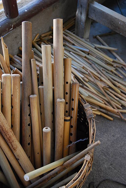 istock Basket filled with wooden pipes 487535295