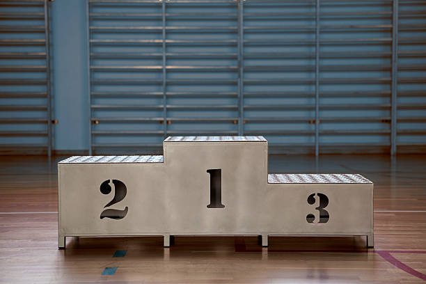 Winners podium with numerals Winners podium with numerals .  Sports hall winners podium photos stock pictures, royalty-free photos & images