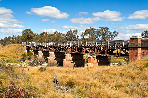 Sunnyside railway bridge over the Tenterfield Creek, Tenterfield, New South Wales, Australia, built from ironbark hardwood in 1888, has fallen into disrepair.