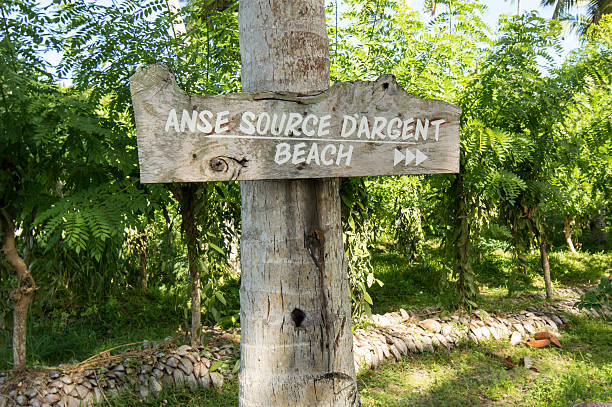 istock Wood sign to Anse Source d’Argent beach, la Digue, Seychelles 487538800