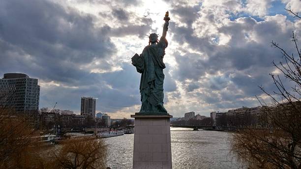istock Paris Statue of Liberty seine river 487543184