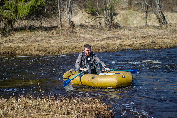 istock Descent down the Lemovzha river in a rubber boat 487546939