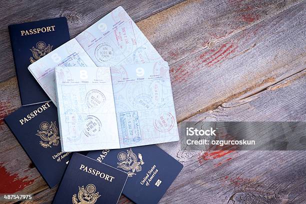 American Passports Open To Reveal Stamps Stock Photo - Download Image Now - Passport, Open, USA