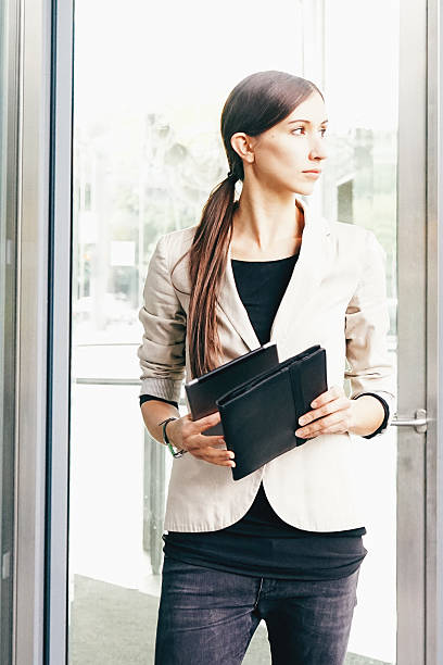 istock Cheerful Businesswoman Using Digital Tablet During Coffee Break 487548618