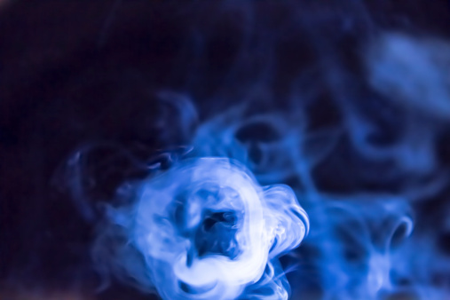 Smoke from a cigarette lit by a powerful torch to highlight the patterns.