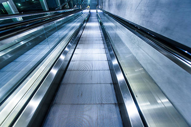 istock Escalator, modern stairs,futuristic background 487552822
