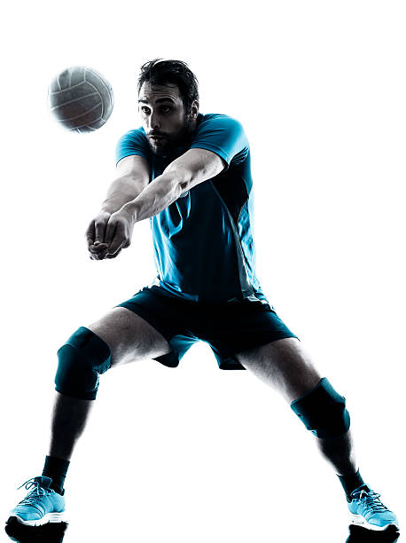 man バレーボールシルエット - volleying sport indoors action ストックフォトと画像
