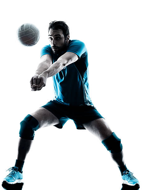 man volleyball silhouette one caucasian man volleyball in studio silhouette isolated on white background volleyball ball volleying isolated stock pictures, royalty-free photos & images