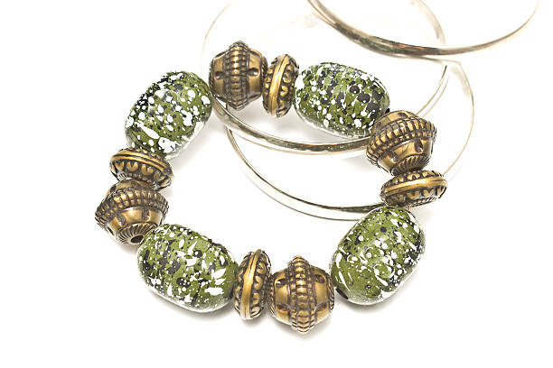 istock Green clay bracelet on white background 487553193