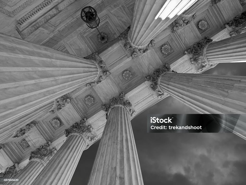 US Supreme Court Columns and Storm in Black and White US Supreme Court building with storm sky in black and white. Supreme Court Stock Photo