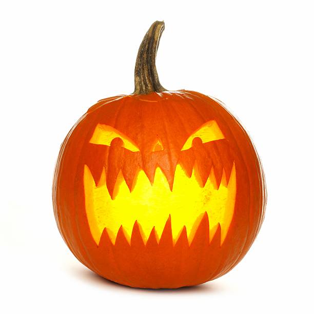 Illuminated Halloween Jack o Lantern isolated on white
