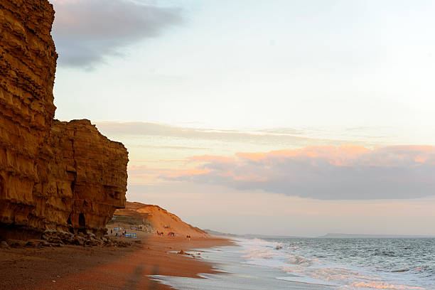 istock beautiful sunset at a beach in Dorset, UK 487558074
