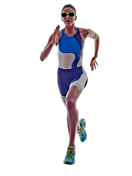 donna di corridore in esecuzione atleta ironman di triathlon - jogging ironman triathalon triathlon ironman foto e immagini stock