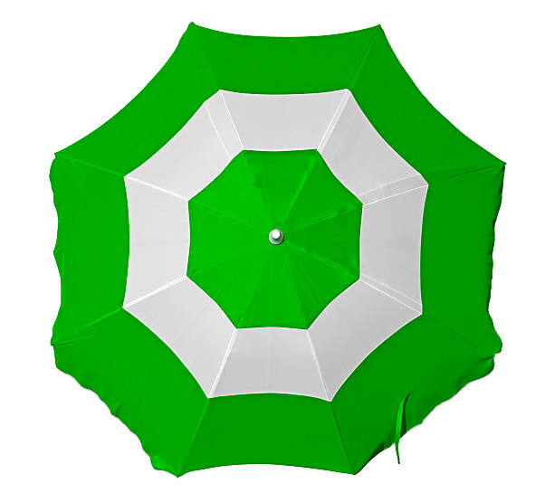 istock Beach umbrella with green and white stripes 487561120