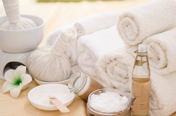 istock Spa treatment with towels and herbal creams 487564954