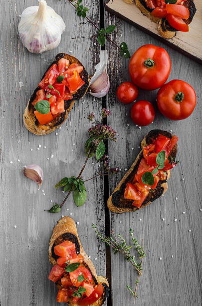 istock Bruschetta with tomatoes, garlic and herbs 487567806