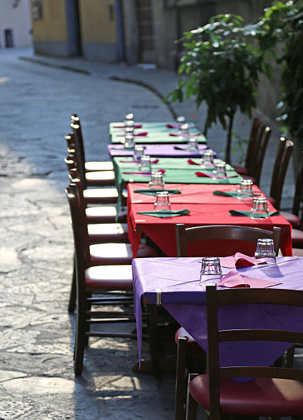 istock restaurant with the tables prepared along the pedestrian street 487568230