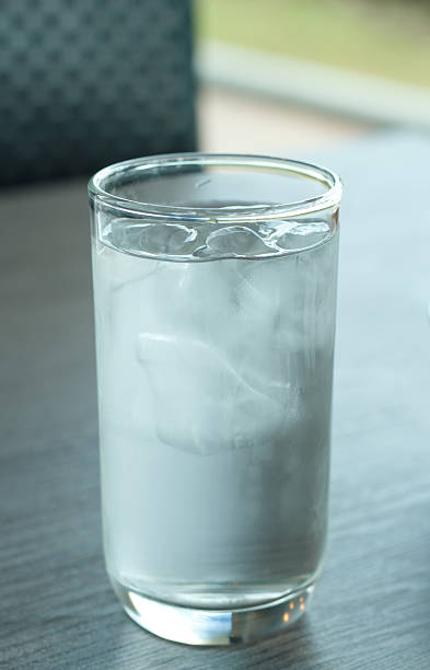 istock Glass of drink water in table setting to lunch. 487568446