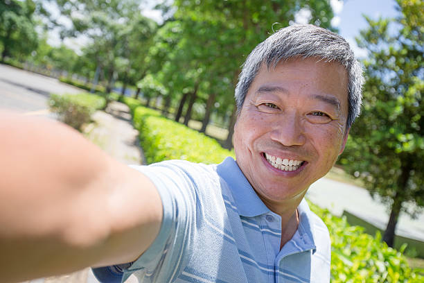 istock man selfie by smart phone 487568624