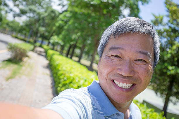 istock man selfie by smart phone 487568626
