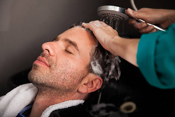 istock Washing hair in a salon 487569199