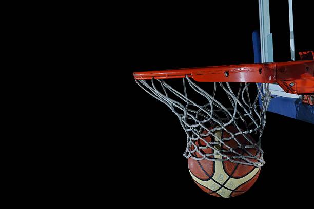 Man Playing Basketball on Sports Court