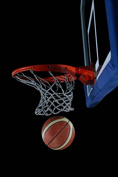 istock basketball ball and net on black background 487569625