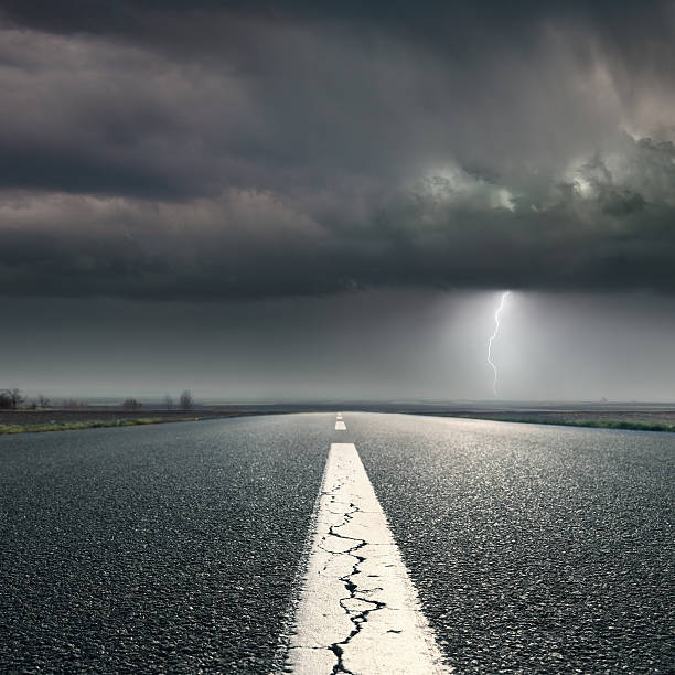istock Driving on highway towards the storm 487570835