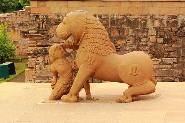 istock King fighting with a lion sculpture in Khajuraho 487572775