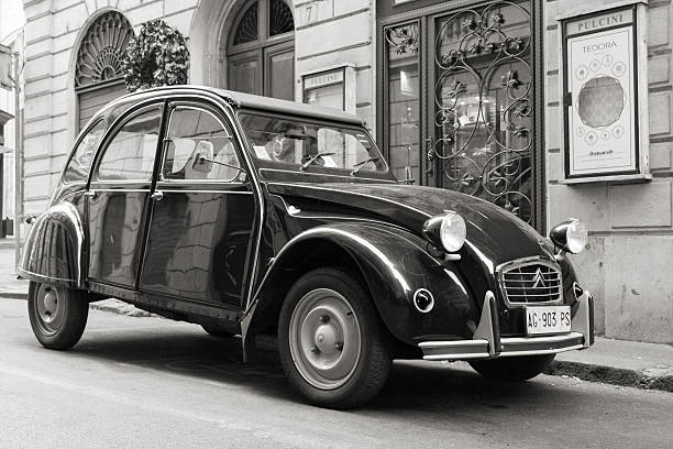 Rome, Italy - August 9, 2015: Oldtimer Citroen 2cv6 Special car stands parked on the city roadside