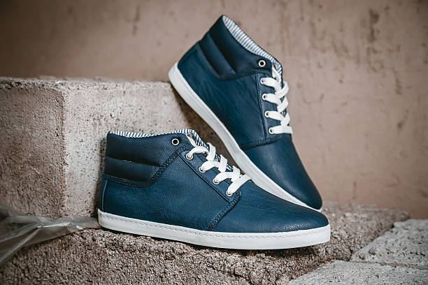 istock Men's shoes, sneakers on nature 487582800