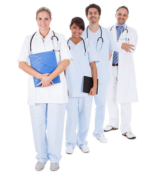istock Group of doctors standing together over white 487584939