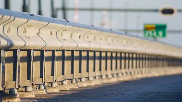 Guard rail or guardrail, sometimes referred to as guide rail or railing, is a system designed to keep people or vehicles from straying into dangerous or off-limits areas.