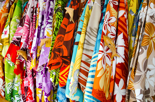 Tropical men shirts on display in the market.traditional clothing worn as a shirts by Polynesians and other Oceanic peoples. Photo by Rafael Ben-Ari/Chameleons Eye