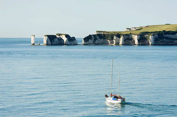 english coastline with chalk cliffs seen from a boat from Poole to cherbourg