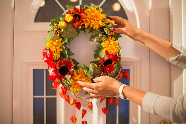 istock Autumn wreath on door. 487593600