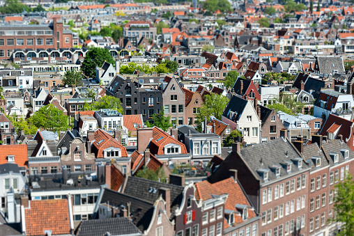 Roofs and facades of Amsterdam. City view from the bell tower of the church Westerkerk, Holland, Netherlands. Shift tilt shot,selective focus.