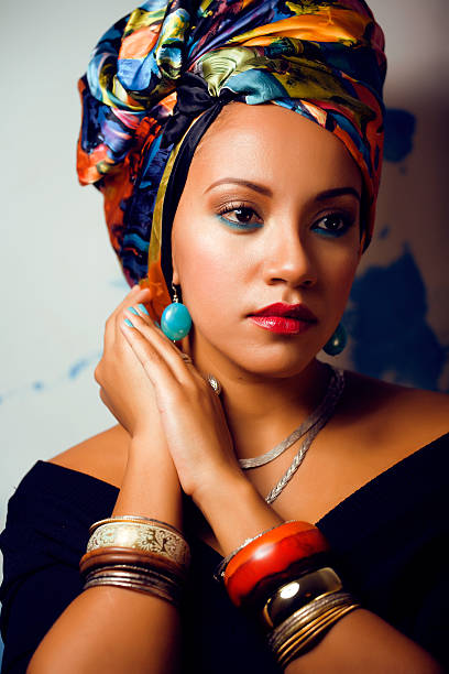 istock beauty bright african woman with creative make up, shawl on 487602540
