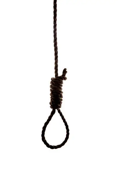 Authentic frayed roope hangman's noose isolated on white