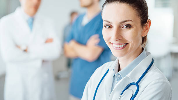 istock Professional female doctor posing and smiling 487605516