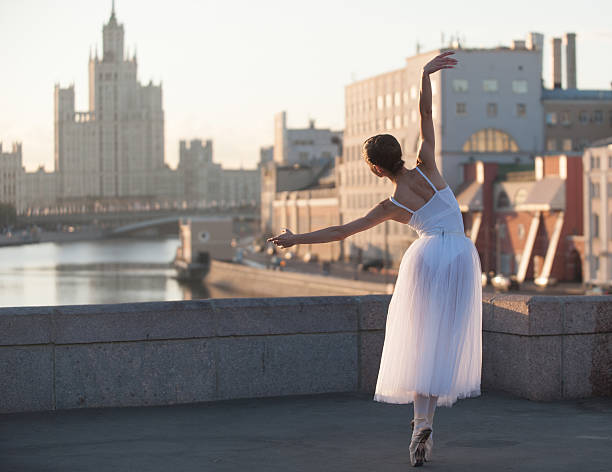istock Ballerina and Moscow cityscape 487607906