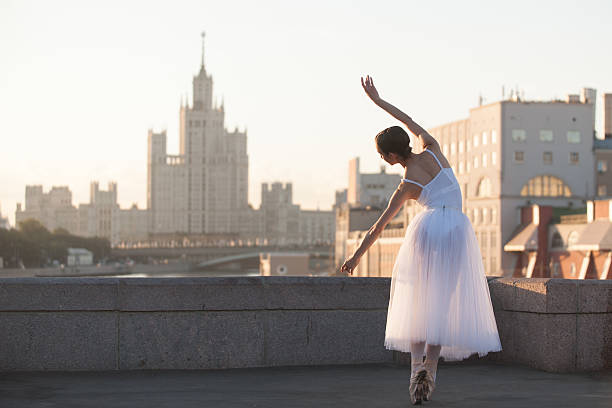 istock Ballerina and Moscow cityscape 487607908