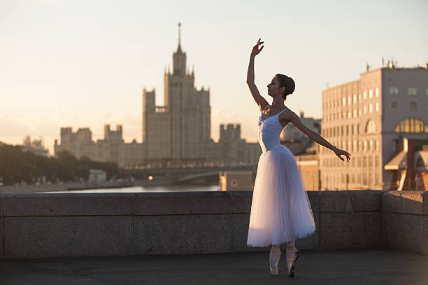 istock Ballerina and Moscow cityscape 487607910