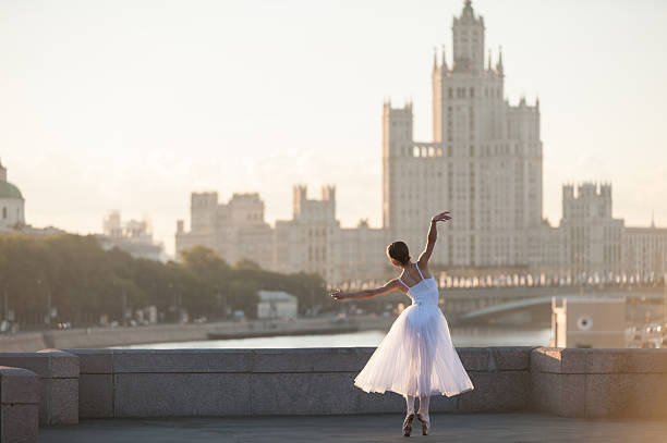 istock Ballerina and Moscow cityscape 487607920