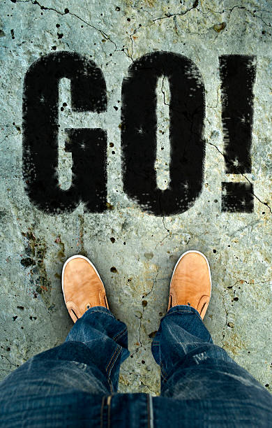 istock man on a tarmac road 487608446
