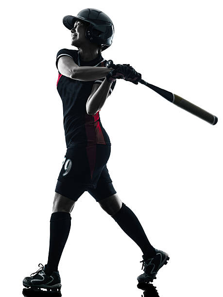 istock woman playing softball players silhouette isolated 487608740