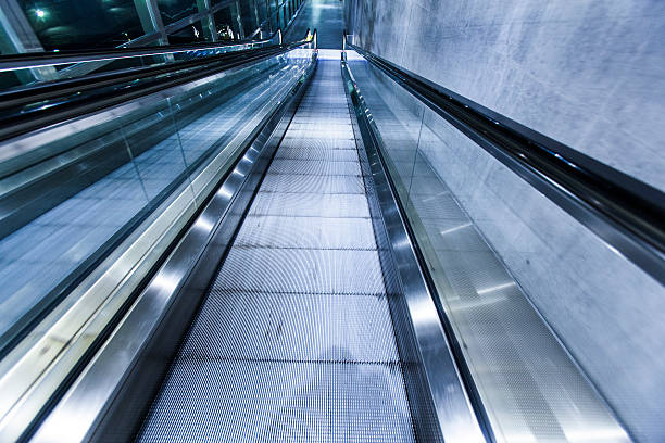 istock Escalator, modern stairs,futuristic background 487608946