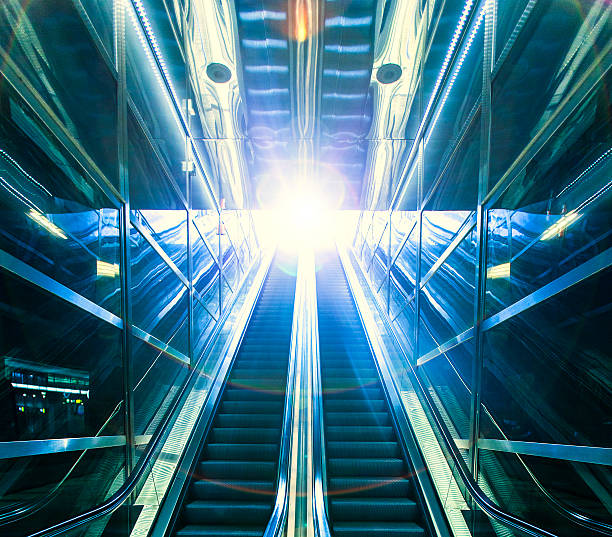 istock Escalator, modern stairs,futuristic background 487608954