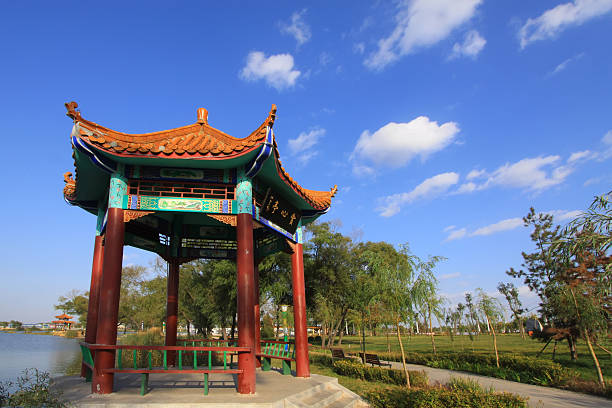 istock Chinese traditional style pavilion in a park 487609021